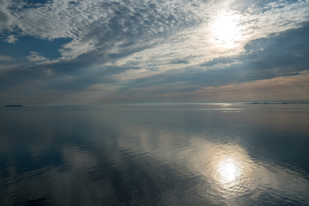 beautiful morning sun over the ocean seen from a cruise ship in denmarkの写真素材