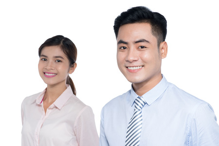 Asian business man and woman are posingの写真素材