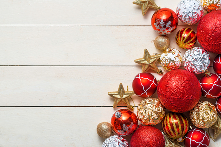 Christmas background with decorations on wooden background. Top view with copy spaceの写真素材