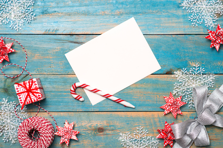 Christmas background with decorations on wooden background. Top view with copy spaceの写真素材