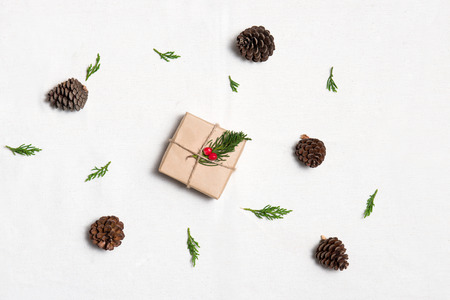 Christmas presents. Hand crafted xmas gift on table.の写真素材