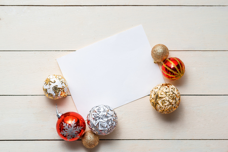 Christmas background with decorations on wooden background. Top view with copy spaceの写真素材