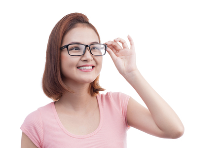 Portrait of a young cheerful asian woman in glassesの写真素材