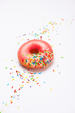 Donuts with icing on white background. Sweet donuts.の写真素材