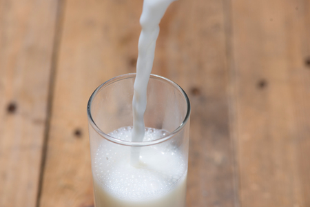 Milk. Image of Milk 
fall into glass.の写真素材