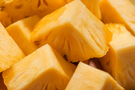 Tropical fruit concept. Cutted pineapple on the old wooden background.の写真素材