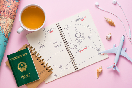 Open notebook with the route for your summer vacationの写真素材