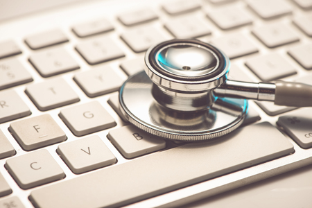 Keyboard and stethoscope and medical records, medical conceptの写真素材