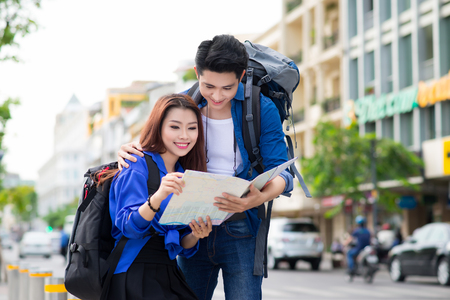 Portrait of an attractive tourist young couple relaxing sightseeingの写真素材