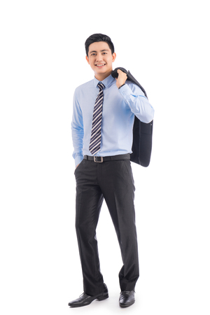 Full length of handsome asian businessman isolated on white backgroundの写真素材