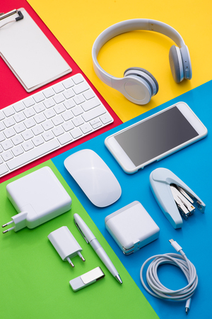 Well organised white office objects on colorful backgroundの写真素材