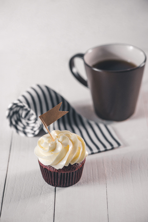 Fathers day concept. Delicious creative cupcake, tie, present.の写真素材