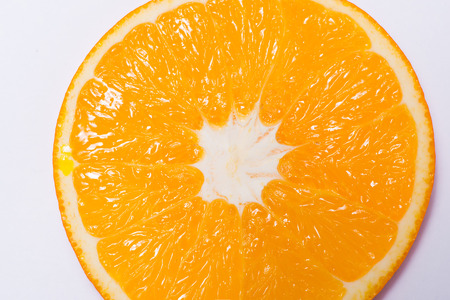 Orange slice isolated on white backgroundの写真素材