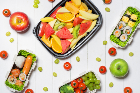 Healthy food concept. Bento box with food, fresh veggies and fruits.の写真素材
