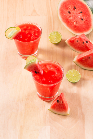 Watermelon drink in glasses with slices of watermelon in summertimeの写真素材
