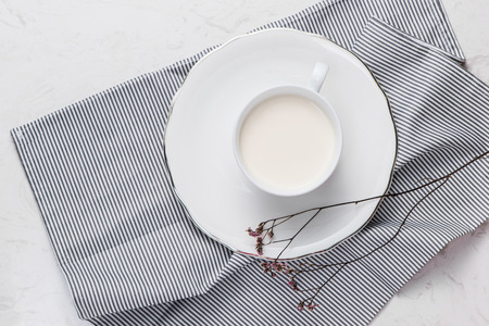 Dairy products. Top view of a cup of milk on a table.の写真素材