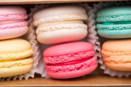 Sweet macarons. Different french cookies macaroons in a paper box.の写真素材
