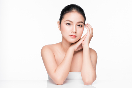 Facial treatment. Beautiful asian woman portrait with perfect skin.の写真素材