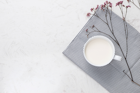 Dairy products. Top view of a cup of milk on a table.の写真素材