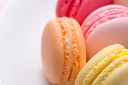 Closeup of colorful pastel macaroons. Sweet macarons.の写真素材