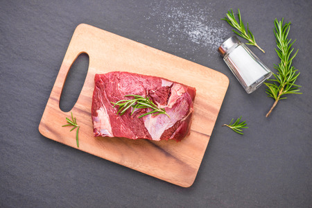 Raw beef cooking with ingredients. Top view with copy spaceの写真素材