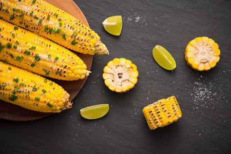 Tasty sweet grilled corn with salt and lime.の写真素材