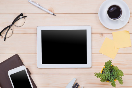 Tablet header image. Office stuff, workplace, top viewの写真素材
