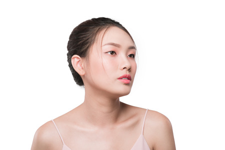 Beautiful woman with clean skin, natural make-up isolated white backgroundの写真素材