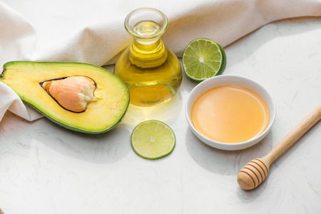 Healthy food concept. Fresh organic avocado on tableの写真素材