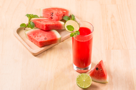 Watermelon drink in glasses with slices of watermelon in summertimeの写真素材