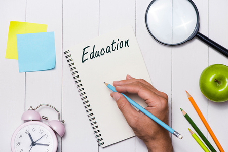 School stationery or office supplies on wood background.の写真素材