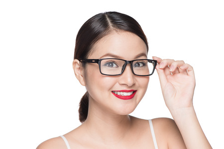 Beauty asian model girl with perfect skin wearing glasses, isolated on white background.の写真素材