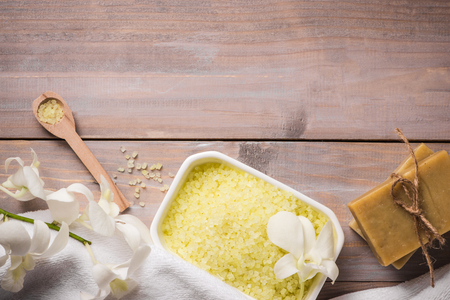 Spa set. Handmade, natural organic soap and white orchid on a wooden backgroundの写真素材