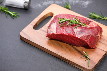 Raw beef cooking with ingredients. Top view with copy spaceの写真素材