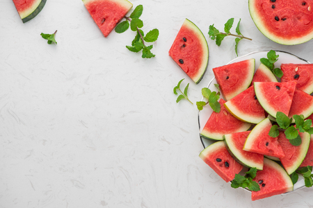 Fresh sliced watermelon on a plate in summertimeの写真素材