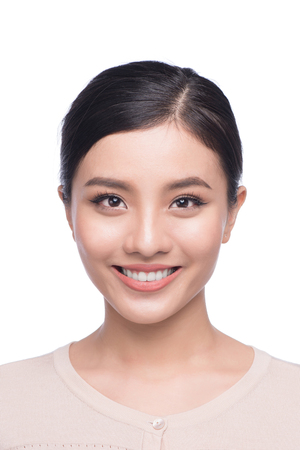Passport photo of asian female, natural look healthy skinの写真素材