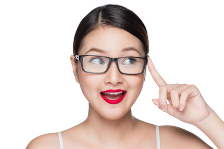 Beauty asian model girl with perfect skin wearing glasses, isolated on white background.の写真素材
