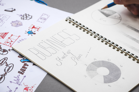 Business concept. Businessman writing idea sketchの写真素材