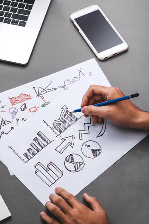 Business concept. Businessman writing idea sketchの写真素材