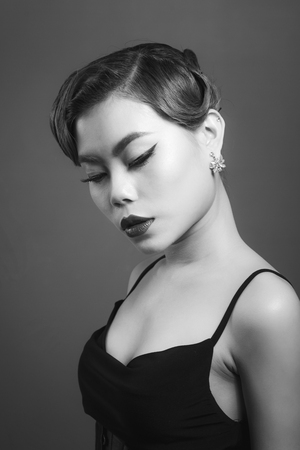 Portrait of a beautiful young woman with brown hair. Beauty and skin care conceptの写真素材