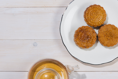 Mooncake and tea, Chinese mid autumn festival food. Angle view from aboveの写真素材