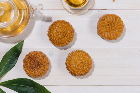 Mooncake and tea, Chinese mid autumn festival food. Angle view from aboveの写真素材