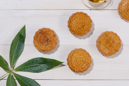 Mooncake and tea, Chinese mid autumn festival food. Angle view from aboveの写真素材