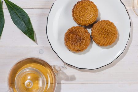 Mooncake and tea, Chinese mid autumn festival food. Angle view from aboveの写真素材