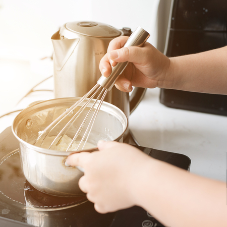 Bakery chef cooking bake in the kitchen professionalの写真素材
