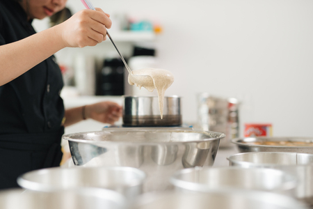 Bakery chef cooking bake in the kitchen professionalの写真素材