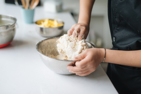 Bakery chef cooking bake in the kitchen professionalの写真素材