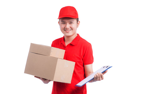 Portrait of delivery man service happily delivering package to costumerの写真素材