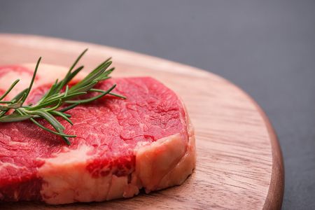 Raw beef cooking with ingredients. Top view with copy spaceの写真素材
