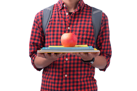 Hands holding red apple with book, isolated on white.の写真素材